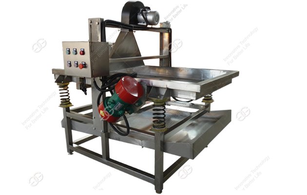 Machine de déshuilage à tamis vibrant